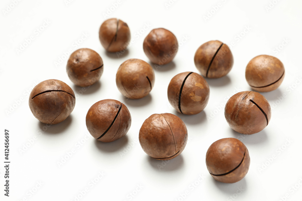 Flat lay with tasty macadamia nuts on white background Flat lay with tasty macadamia nuts on white background