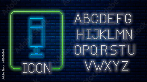 Glowing neon Punching bag icon isolated on brick wall background. Neon light alphabet. Vector.