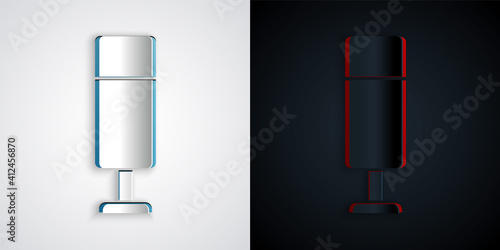Paper cut Punching bag icon isolated on grey and black background. Paper art style. Vector.