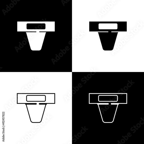 Set Groin guard for martial arts icon isolated on black and white background. Vector.