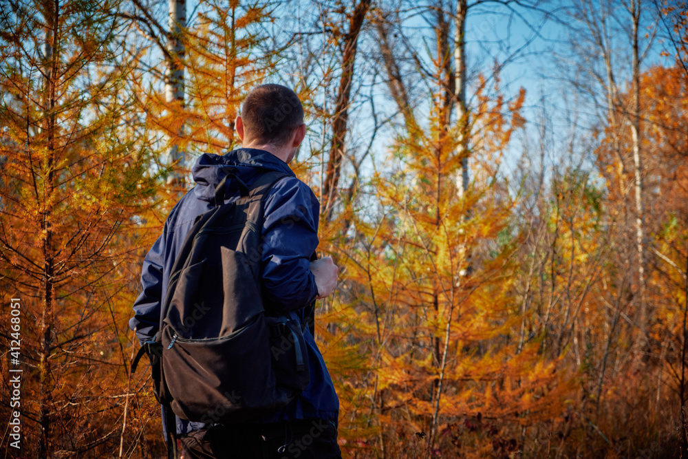 autumn forest and lake in russia,
guy walks, against the background of yellow spruce, view from the back, scars on the neck autumn forest and lake in russia,
guy walks, against the background of yellow spruce, view from the back, scars on the neck