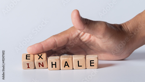 hand holding dice with text for illustration of 