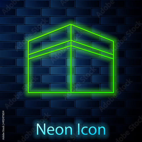 Glowing neon line Kaaba mosque icon isolated on brick wall background. Kaaba hajj Mecca pray pilgrimage Ramadan Islam muslim mosque. Vector.