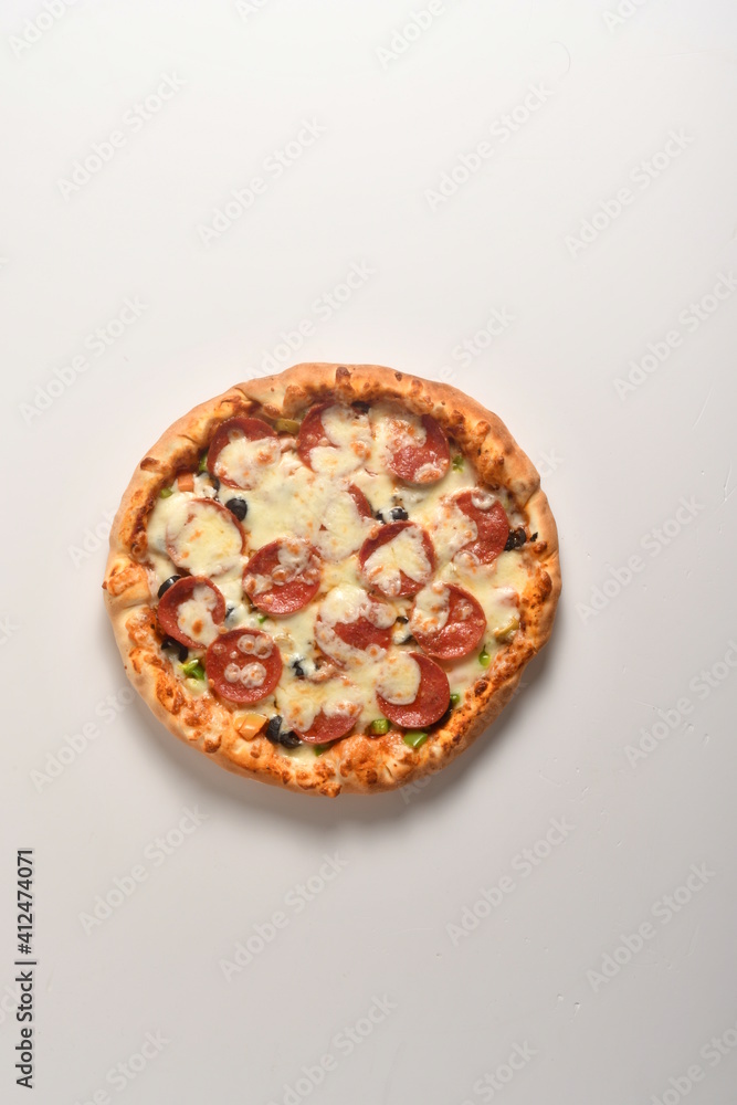 Fototapeta Pizza with cheese isolated on white background. Pizza top view.