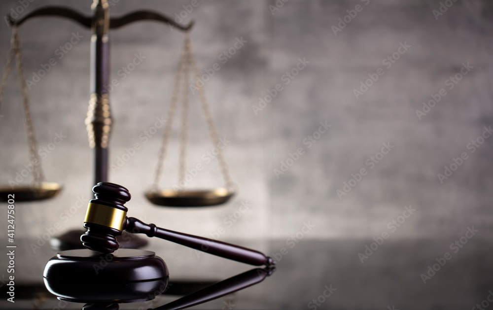 Law and justice concept. Law symbols composition: judge’s gavel and scale. Law and justice concept. Law symbols composition: judge’s gavel and scale.