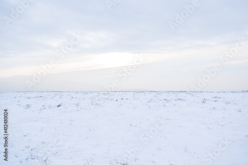 Snowy meadow on a hill