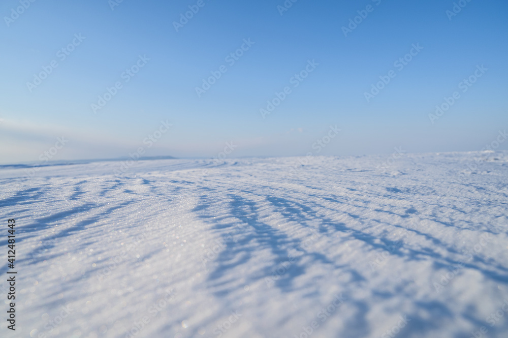 Natural abstract background. Snow surface.