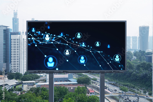 Photography Glowing Social media icons on road billboard over panoramic city view of Kuala Lumpur, Malaysia, Asia