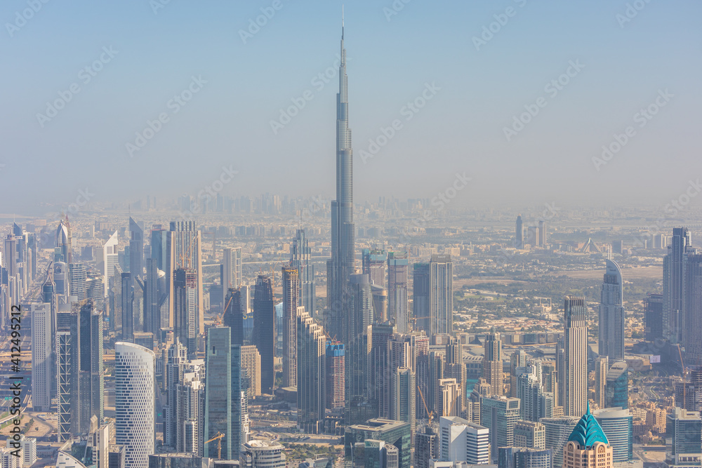 Obraz premium DUBAI, UAE - December, 2020: Aerial view from helicopter of the Dubai skyline, United Arab Emirates