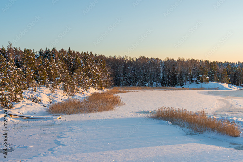 Winter seascape, frozen sea and island coast. Winter seascape, frozen sea and island coast.