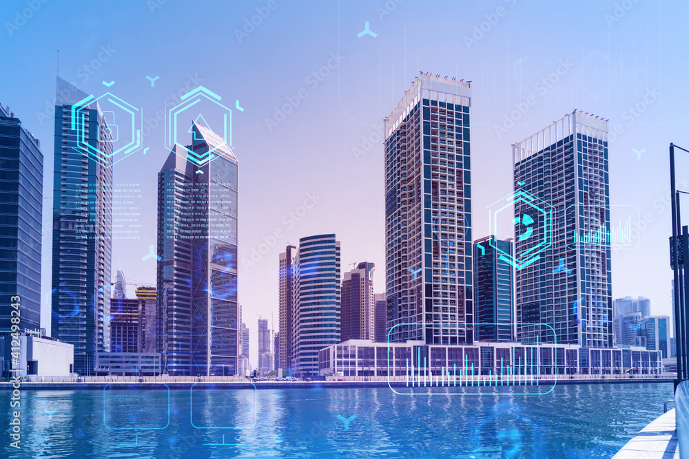 Skyscrapers of Dubai business downtown. International hub of trading and financial services. Technology theme icons hologram, Fintech concept. Double exposure. Dubai Canal waterfront. Skyscrapers of Dubai business downtown. International hub of trading and financial services. Technology theme icons hologram, Fintech concept. Double exposure. Dubai Canal waterfront.