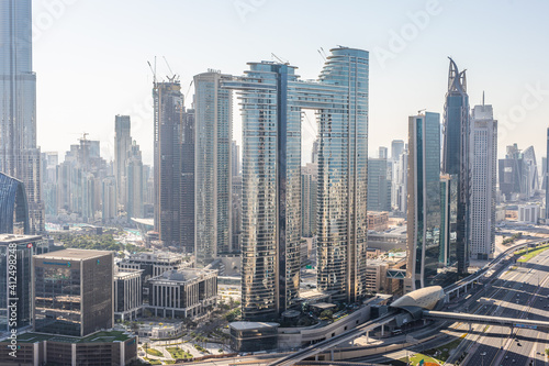 DUBAI, UAE - December, 2020: Dubai skyline with beautiful city close to it's busiest highway on traffic