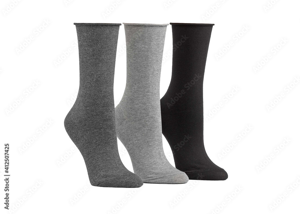 Set of short socks white, grey, black isolated on white background. Three pair of socks in different colors. Sock for sports on invisible foot as mock up for advertising, branding, design. Set of short socks white, grey, black isolated on white background. Three pair of socks in different colors. Sock for sports on invisible foot as mock up for advertising, branding, design.