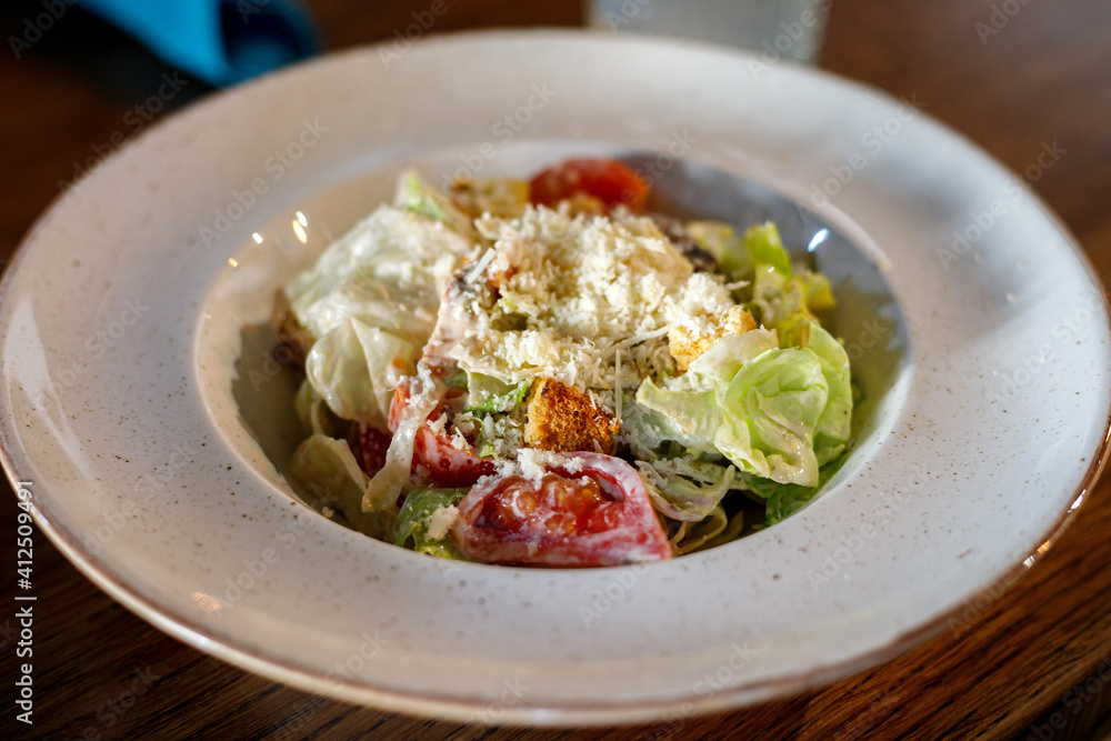 Fresh Caesar salad on a plate Fresh Caesar salad on a plate
