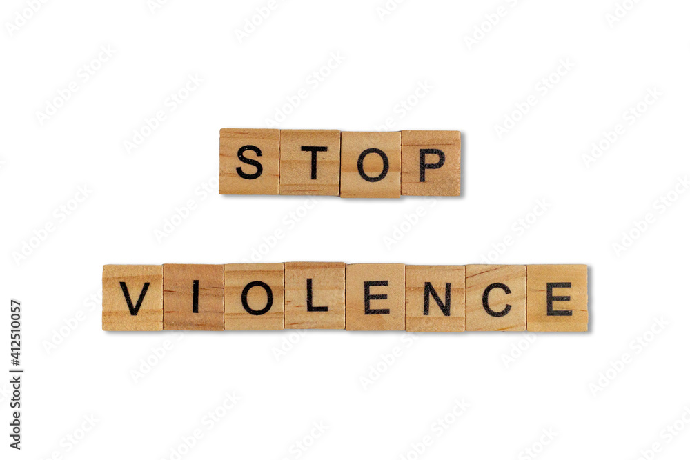Top view of the word stop violence laid out from square wooden tiles isolated on white background. World and international day. Top view of the word stop violence laid out from square wooden tiles isolated on white background. World and international day.
