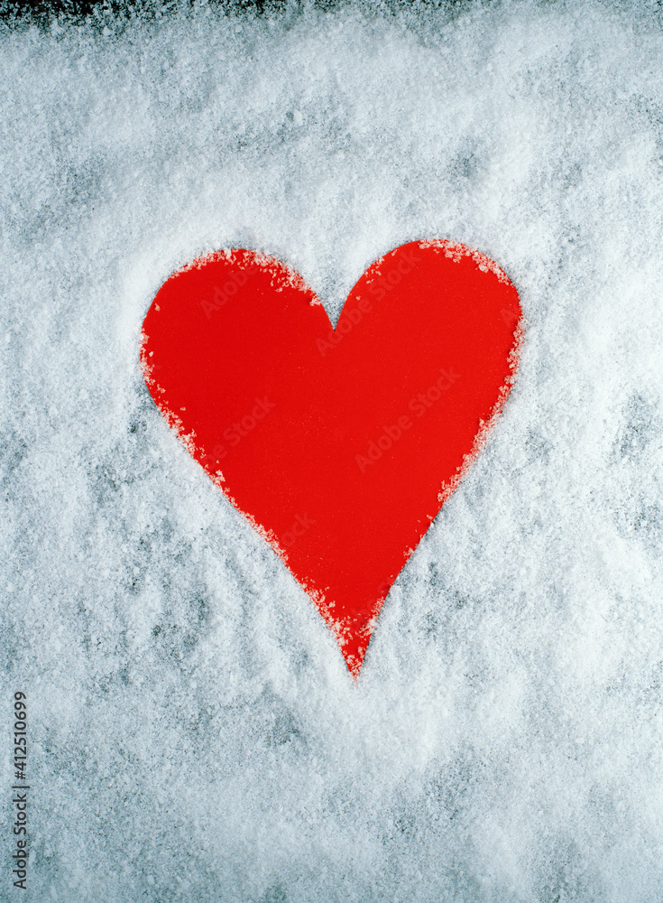 red heart in snow red heart in snow