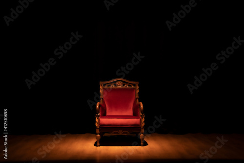 Red wooden seat on the theater stage
