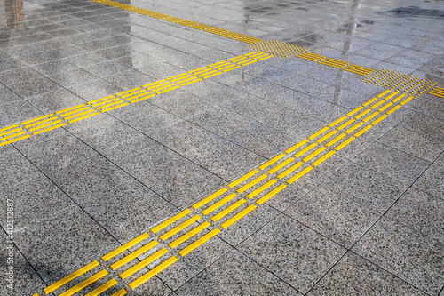 Bright yellow tactile paving for the visually impaired © Ahmet Burcak Gozcu