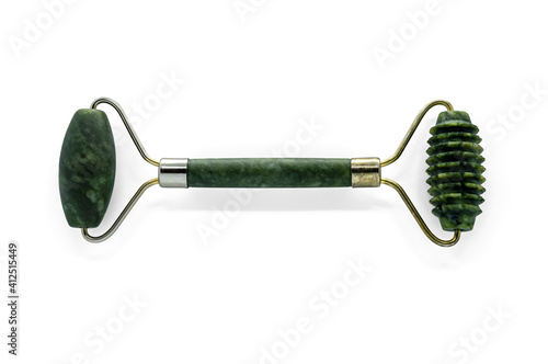 jade stone facial massager on a white background close-up