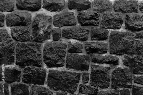Textured stone wall. Close up of masonry. 