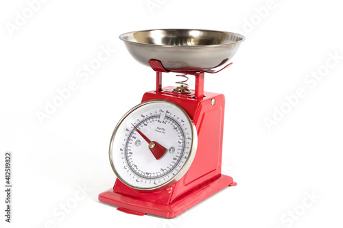 Mechanical scales to the kitchen red.