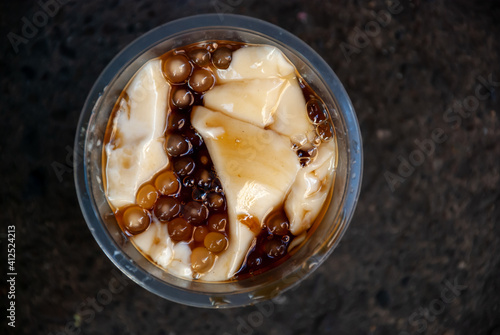 Sweetened delicacy soft soy curd locally known in the Philippines  as taho
