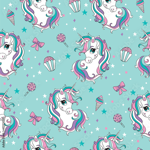 Magic seamless pattern with heads of unicorns and sweets
