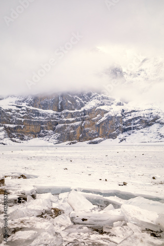 Wallpaper Mural Ice from a frozen lake in a snowy mountain landscape Torontodigital.ca