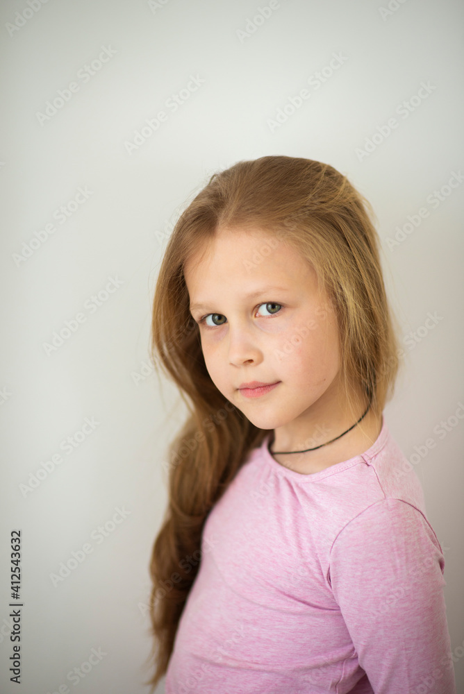Emotional girl with blonde hair on a white background
Cute 8-10 year old girl in pink T-shirt Emotional girl with blonde hair on a white background
Cute 8-10 year old girl in pink T-shirt