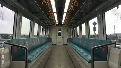 The situation when an empty light rail car without a passenger when walking from the Jakabaring station to the Ampera Bridge station is suitable for your additional video photo