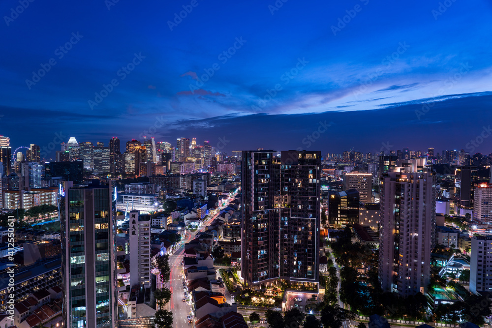 Wide panorama of Singapore cityscape at magic hour. Wide panorama of Singapore cityscape at magic hour.