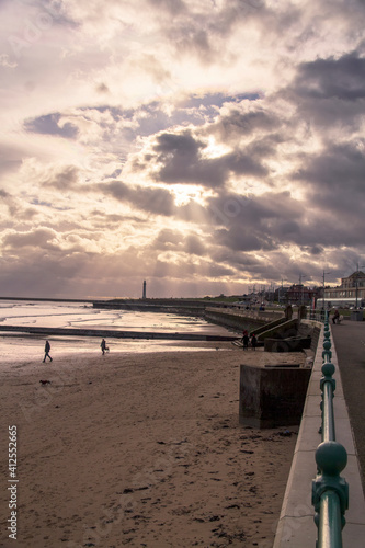 Dramatic sky over Seaburn Beach at sunset. photo