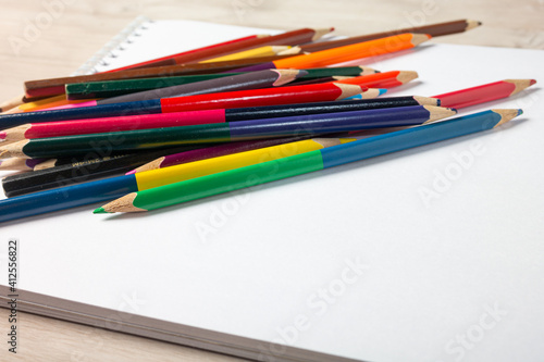 pencils on a notebook