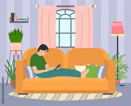 A man lying on the sofa, holding a smartphone. Relaxing at home concept vector flat design. Cheerful man is sitting on couch and is holding phone in hand. Rest time, leisure, free time after work