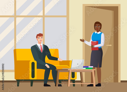 Office workers discussing matters. Businessmen dressed in formal clothes with laptop talking. Business meeting and consideration of working issues at workspace. Woman talking to a man colleague