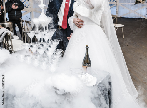 Pyramid of glasses with champagne close up. photo