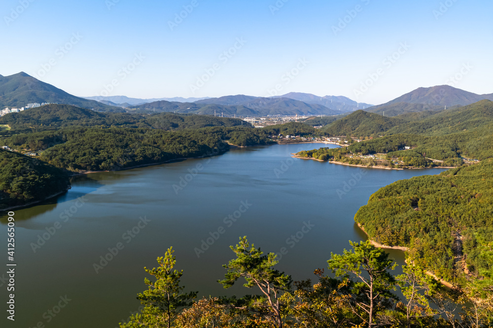 Beautiful lake and autumn scenery of Hoe-dong dam
 in Geumjeong-gu, Busan, South
Korea.