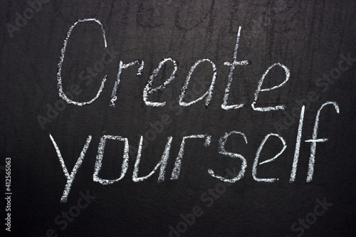 Obraz na płótnie
Inscription on a dark board Create yourself. Motivational lettering w salonie