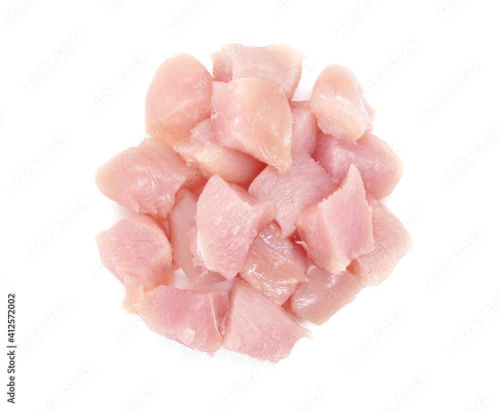 Pieces of chicken fillets isolated on white background. Small pieces of raw meat. Top view. Pieces of chicken fillets isolated on white background. Small pieces of raw meat. Top view.