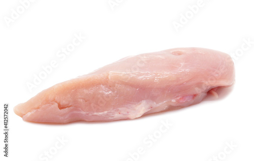 Raw chicken fillets isolated on white background. One piece of fresh chicken meat without skin.