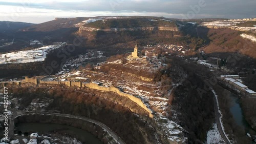 Aerial video around Tsarevets Hill with the Patriarchal Church and part of Veliko Tarnovo town with Yantra river, Bulgaria photo