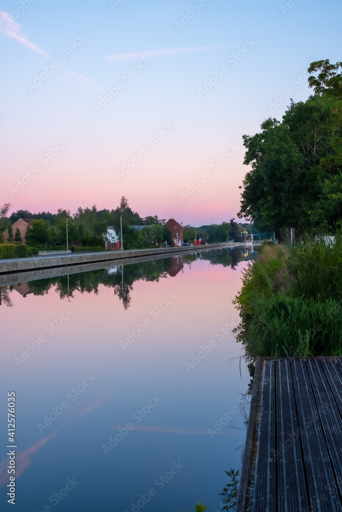 Colourful Sunsets Over a canal or river. High quality photo
