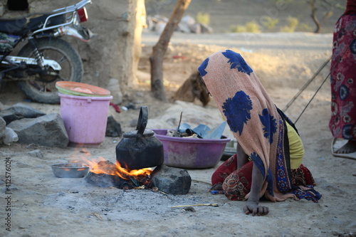  A Yemeni girl lives with her family in a camp for displaced people fleeing the hell of war in the city of Taiz, Yemen photo