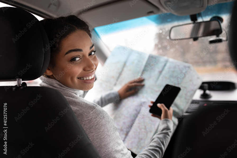 Lady enjoying comfortable auto journey sitting on driver seat Lady enjoying comfortable auto journey sitting on driver seat
