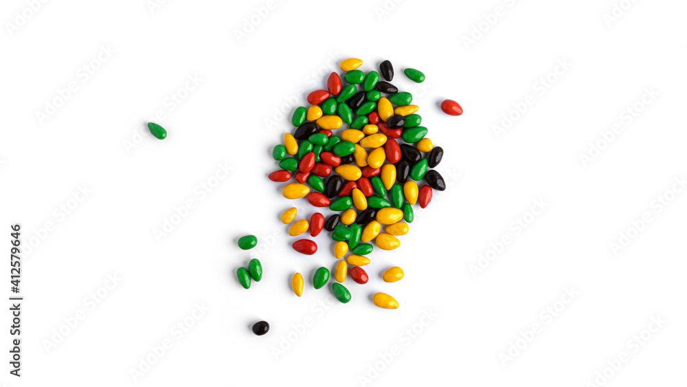 Colored chocolate sunflower seeds isolated on a white background