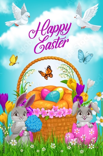Easter egg hunt basket and bunnies vector design. Easter religion holiday rabbits with eggs, cake and spring flowers on green grass field with daffodils, crocuses, flying butterflies and white doves © Vector Tradition