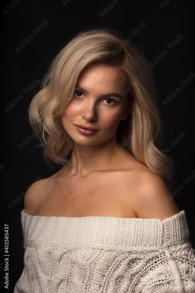 Blonde, studio portrait of a young girl Blonde, studio portrait of a young girl