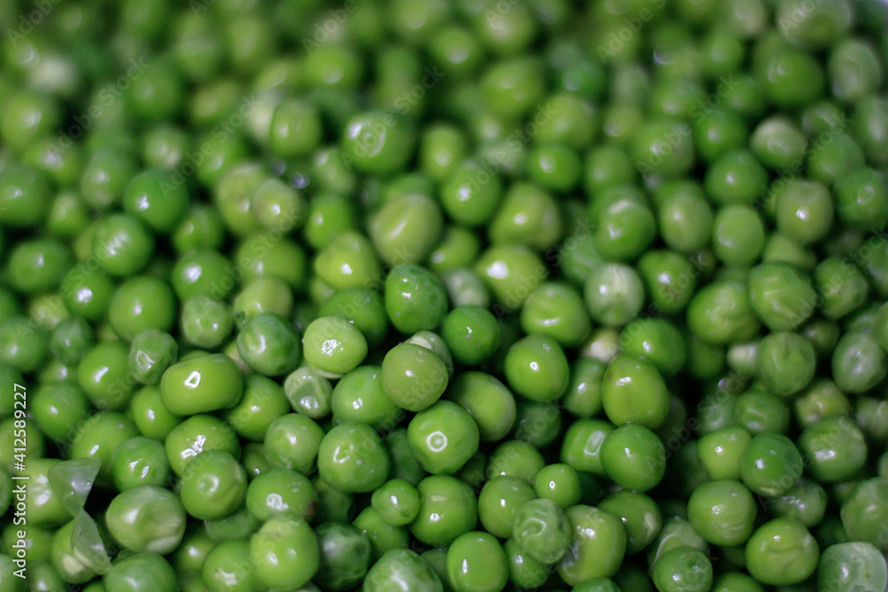 Green pea. Green background. Pea background. View from above. Healthy lifestyle. Proper nutrition Green pea. Green background. Pea background. View from above. Healthy lifestyle. Proper nutrition