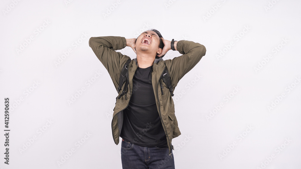 Asian man wearing bag confused and frustased white background Asian man wearing bag confused and frustased white background