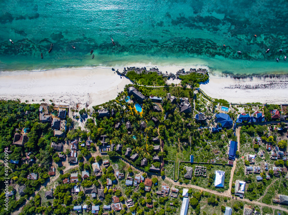 Drone View of tipical village in Zanzibar, Tanzania - Africa. Ocean Pacific coast. 